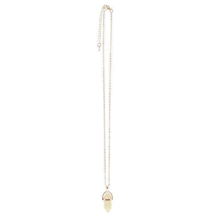 Gold necklace with a pendant on a white background