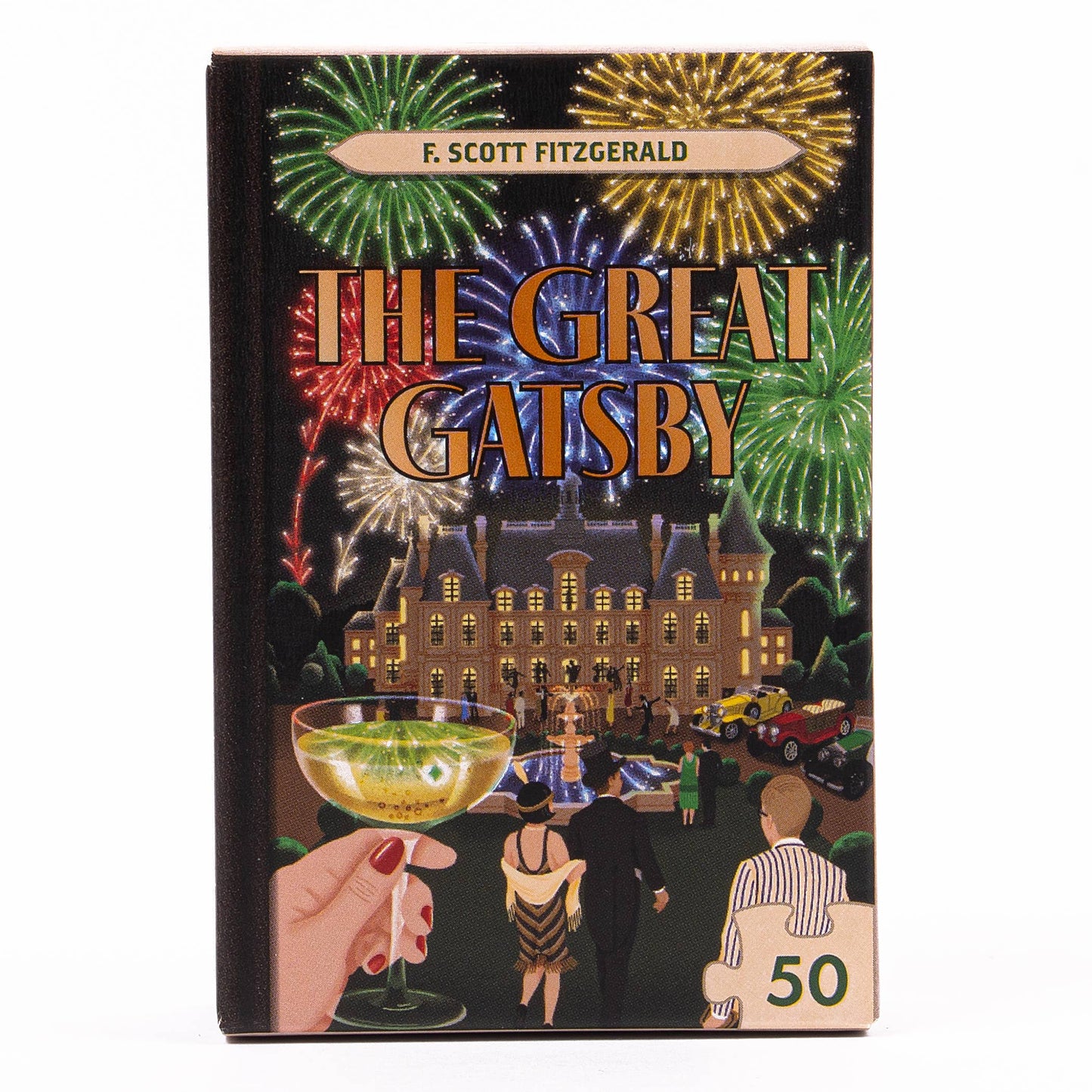 Great Gatsby themed jigsaw puzzle. The scene is set at night with dark black colouring, with bright fireworks exploding at the top of a big mansion. Cars are parked to the side and people are walking in front of a grand water fountain. A woman’s hand with red nail polish is holding up a cocktail drink. There is a party going on. 