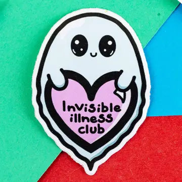 A small cartoon sticker of a ghost holding a pink heart that reads 'invisible illness club'.